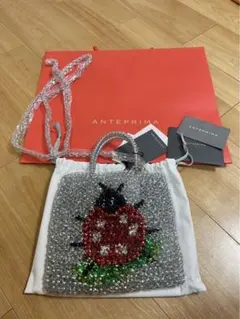 アンテプリマ フェイラー てんとう虫ワイヤーバッグ シルバーゴールド
