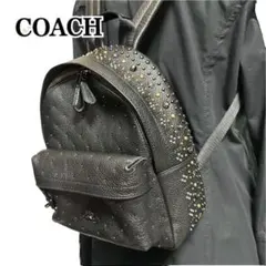 COACH レザー スタッズ リュック バックパック - メルカリ