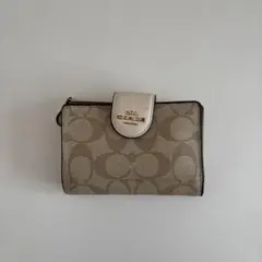 COACH 二つ折り財布 シグネチャー ベージュのサムネイル