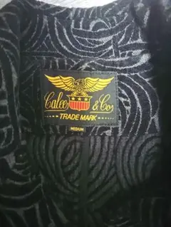 最終値下げ 美品 レア CALEE コート ブラック 総柄 スパイラル柄 M