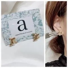 2361☺︎ゴールドの結び目とパールのチタンピアス☺︎