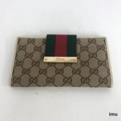 美品✨️グッチ 長財布 GGキャンバス フラップ ロゴプレート レザー