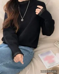 フリル付きハイネック黒ニットセーター