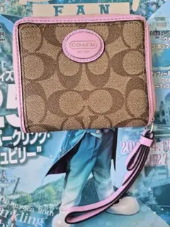COACH シグネチャー　ラウンドファスナー　二つ折り財布 ブラウン/ピンク