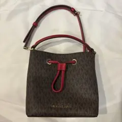 MICHAEL KORS バケットバッグ ブラウン/レッド - メルカリ