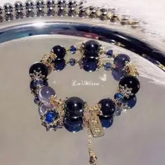 装飾的な黒と青のブレスレット青い色一点