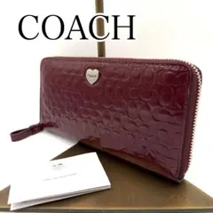 新品 COACH バーガンディ 型押しロゴ 長財布　シグネチャー　F52083