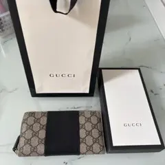 新品未使用GUCCI (グッチ)テクニカルニット オレンジグレー メガネ