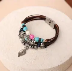 ターコイズブレスレット　インディアン　ナバホ族　レザー調　フェザー