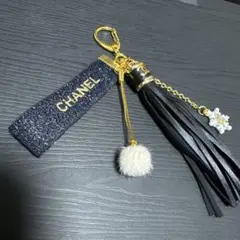 CSp-4-CHANEL 限定リボン雪の結晶OLグリッタータッセルキーホルダー