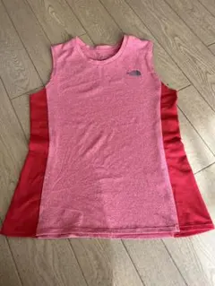 THENORTHFACEのトレーニングウェア、色はオレンジに両側レッド、サイズM