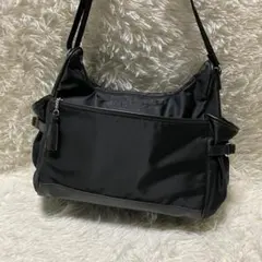 agnes b ナイロン ショルダーバッグ タッセル クロスボディ ロゴ刺繍