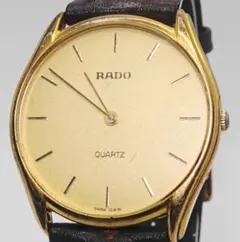RADO 129.4075.4N クォーツ クポール 腕時計 ゴールド 黒文字盤 - メルカリ