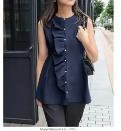 新品未使用　フリル　ニットベスト　ジレ　ペプラム　パールボタン