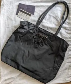 【希少】PRADA プラダ フラワーモチーフ レザートートバッグ 黒 希少】PRADA プラダ フラワーモチーフ レザートートバッグ 黒 - メルカリ