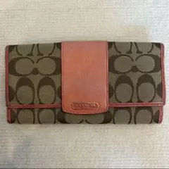 Coach フラップ式長財布 ピンクオレンジ