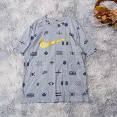NIKE 総柄Tシャツ M ビッグスウッシュ 国旗プリント 半袖 メンズ ナイキのサムネイル