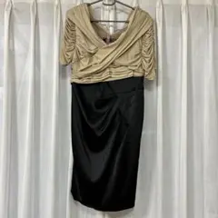 ベージュと黒のドレープデザインドレス