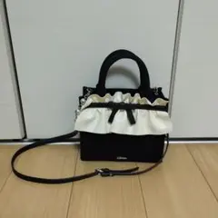 pium フリルリボンスクエアミニトートバッグ ブラック