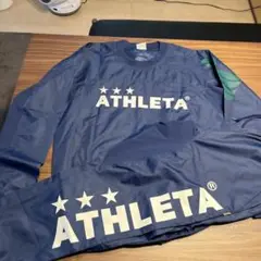 ATHLETA ネイビー ピステ・ウィンドブレーカー