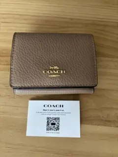 COACH ベージュ 三つ折り財布のサムネイル