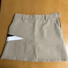 テーラーメイドゴルフ ベージュ×ブラック ラップ風キュロットスカート