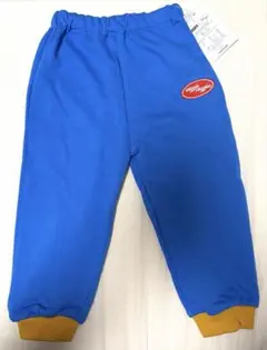 【新品】wiggle wiggle青色カジュアルパンツ 花ワッペン付