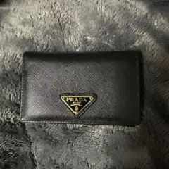D*K様 PRADA 生産終了モデル‼️二つ折り財布 ブラック - メルカリ