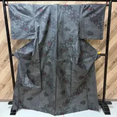 あ595 本場大島紬 着物 黒地 幾何学模様 - メルカリ