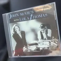 ジョン・マクヴィーズ・ガッタ・バンド・ウィズ・ローラ・トーマス