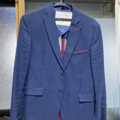 青いブレザー 赤いステッチのサムネイル