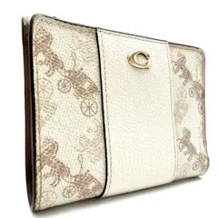 未使用　COACH　二つ折り財布　タビー　ロゴ金具　総柄　PVC　レザー　馬車柄