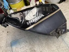 ホンダCB２２３S純正タンク凹みあり パテ埋め中と仮塗装まで ホンダCB223S純正タンク凹みあり パテ埋め中と仮塗装まで - メルカリ
