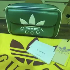 GA573 GUCCI x adidas ボディバッグ - メルカリ