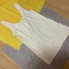 흰색 바탕에 검은색 점이 있는 할인된 가격의 탱크탑 XS