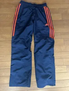 adidas ストライプジャージパンツ ネイビー/オレンジ
