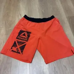 オレンジ ショートパンツ