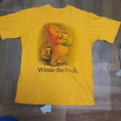 ディズニーDISNEY古着屋購入くまのプーさんビッグロゴTシャツM~L濃イエロー