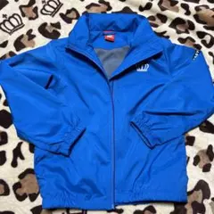 青いナイロンジャケット 王冠刺繍