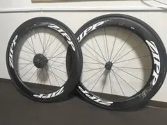ZIPP 404 CLINCHER ホイールセット アルミリム 新品タイヤ付き - メルカリ