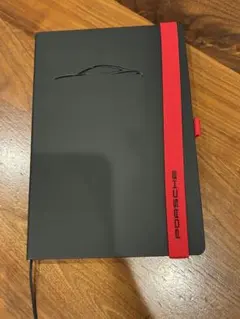 ［値下げします］Porsche ノート 黒 赤いストラップ付きのサムネイル