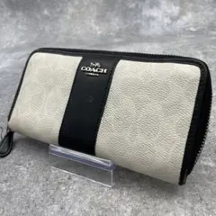 COACH コーチ　長財布　ホワイト　ジッピー　シグネチャー　レザーのサムネイル
