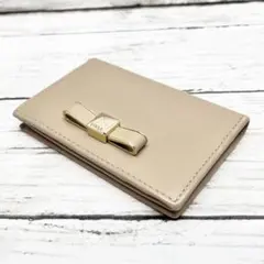 FURLA フルラ 名刺入れ ベージュ リボン スタッズ レザーのサムネイル