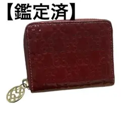 【鑑定済】COACH レッド エンボス花柄 二つ折り財布