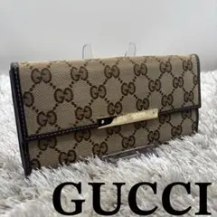GUCCI ロゴプレート フラップGGキャンバス 長財布 ブラウン - メルカリ