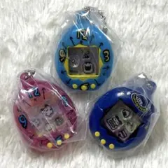 たまごっち シャカシャカチャームコレクション クリアピンク・ブルー・紺