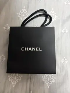 CHANEL カメリアモチーフ 黒い紙袋