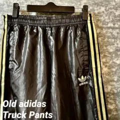 adidas トラックパンツ 黒タグ 刺繍ロゴ 金ライン 古着 アディダス