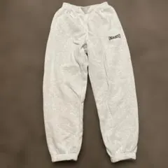 GU グレー ロゴ入りパンツ 裏起毛150サイズ