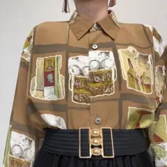 ブラウン系 アート柄 レトロ ゆったり ヴィンテージ 柄シャツ 古着のサムネイル